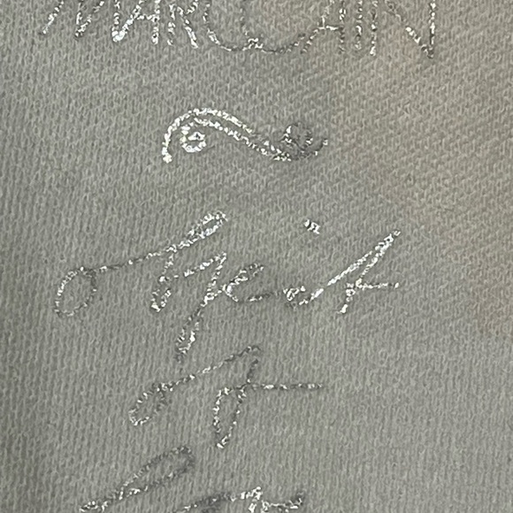 Marc Cain ivory feminine ruffle v neck blouse. Cap sleeve with ruffle. Very soft - Picture 8 of 10